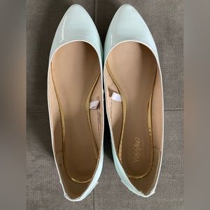 Mint green flats with gold embellishments, some wear